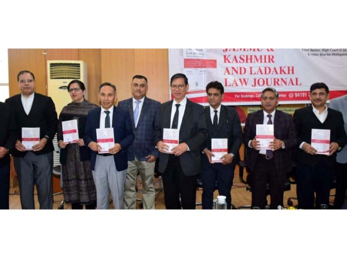 Chief Justice of J&K N Kotiswar Singh along with other Judges releasing JKLLJ on Thursday. Chief Justice of J&K N Kotiswar Singh along with other Judges releasing JKLLJ on Thursday.