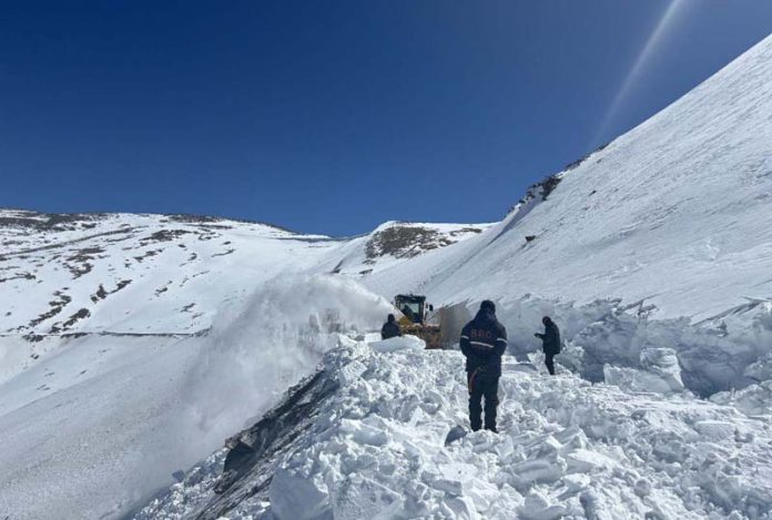 Men and machinery of BRO during snow clearance work on Leh-Manali NH.