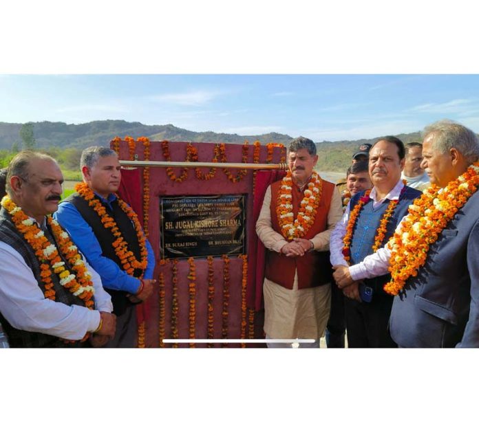 MP Jugal Kishore Sharma, flanked by other BJP leaders, inaugurating Baldoh Bridge in Jammu District on Friday. MP Jugal Kishore Sharma, flanked by other BJP leaders, inaugurating Baldoh Bridge in Jammu District on Friday.