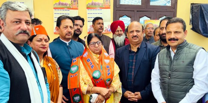 BJP leaders at a joining programme in Hakkal Panchayat of RS Pura on Sunday.