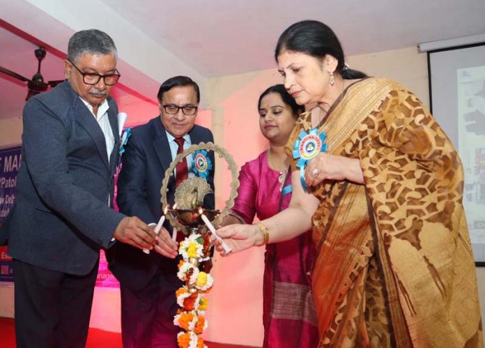 Guests lighting ceremonial lamp during inaugural of Business Tech Conclave at IMS.
