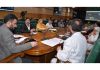 Secretary H&ME Dr Syed Abid Rasheed Shah chairing a meeting.