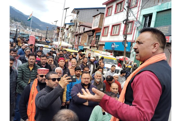 A man addressing protesters in Bhaderwah during a protest against rash driving. - Excelsior/Tilak Raj A man addressing protesters in Bhaderwah during a protest against rash driving. - Excelsior/Tilak Raj