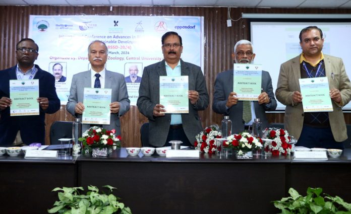 CUJ Vice-Chancellor and others releasing souvenir during inaugural of conference.