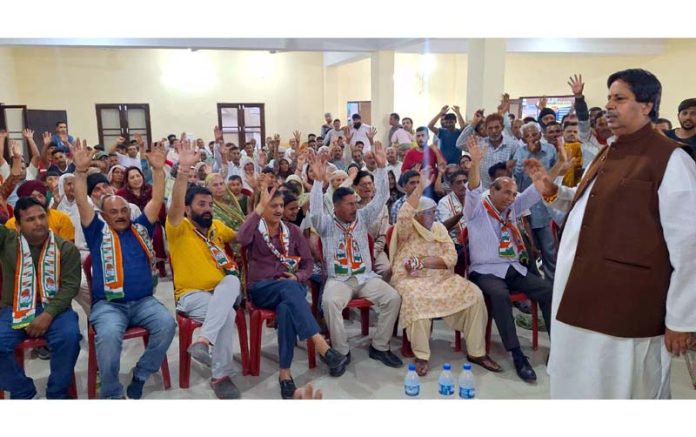 Congress candidate Raman Bhalla addressing public meeting in Chatha area of Jammu South.