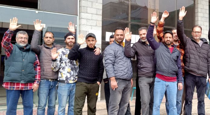 Shopkeepers of Sangarmal Shopping Complex during a protest on Saturday. -Excelsior/Shakeel