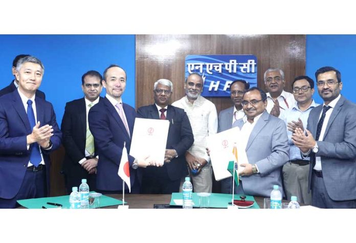 Senior officers of NHPC and JBIC Japan during signing of loan agreement.
