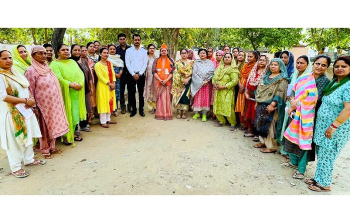 BJP activists during an outreach programme in Channi Rama on Friday.
