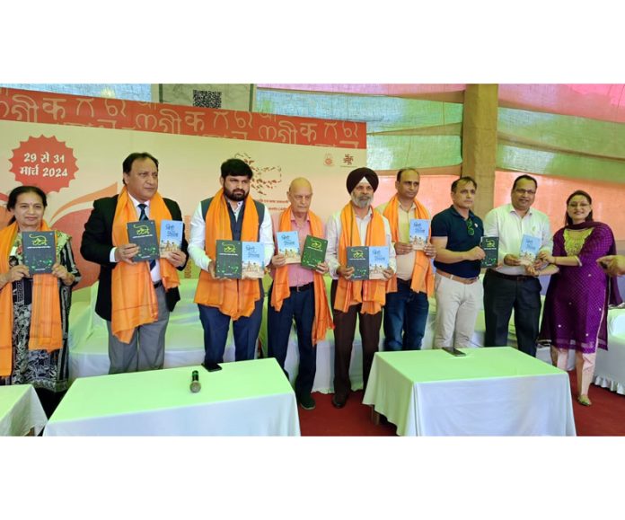 Dignitaries during a book release function at Jammu on Saturday.