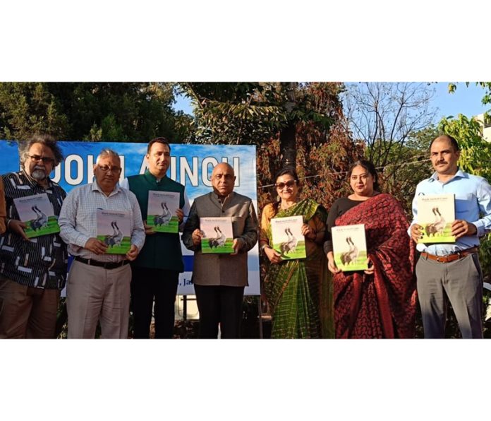 Principal Secretary Department of Culture Suresh Kumar Gupta releasing Heena Mahajan's book on Saturday.