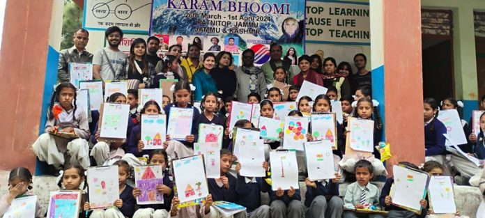 Students from various schools posing with their art works during a camp held at Patnitop on Friday.