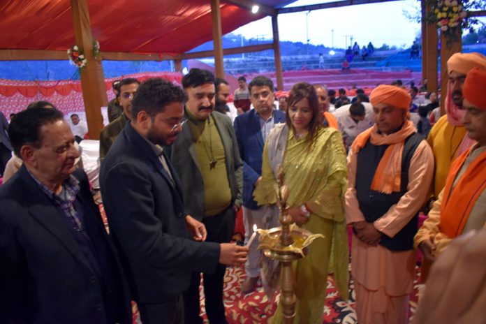 DC Jammu lighting a ceremonial lamp during Mahashivratri Mahotsav on Thursday.