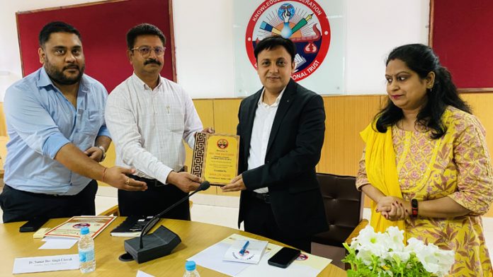Advocate Nar Hari Singh receiving memento from Dr Samar Dev Singh Charak, Secretary of Dogra Educational Trust on Thursday. Advocate Nar Hari Singh receiving memento from Dr Samar Dev Singh Charak, Secretary of Dogra Educational Trust on Thursday.