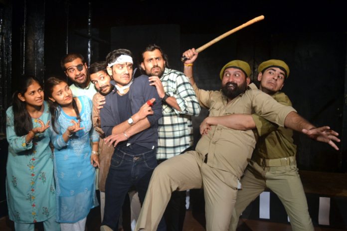 A scene from play 'Girgit' staged in Jammu on Friday.