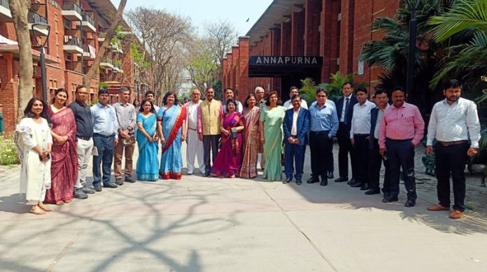 Gunjan Dave, Member Digital Communication Commission along with the professionals from telecom industry during a workshop on Tuesday.