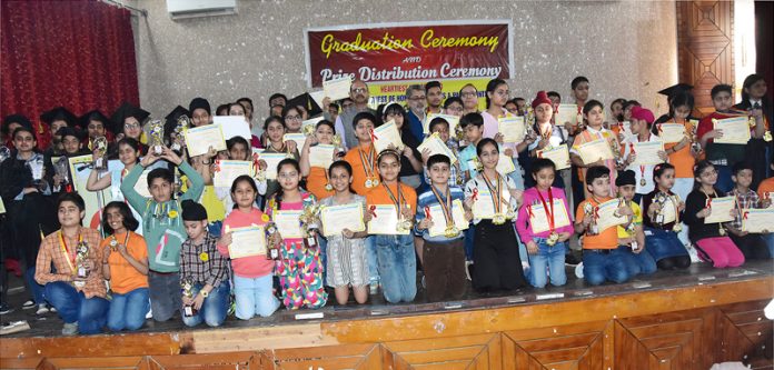 Winners of Speed Maths Competition posing with their certificates.