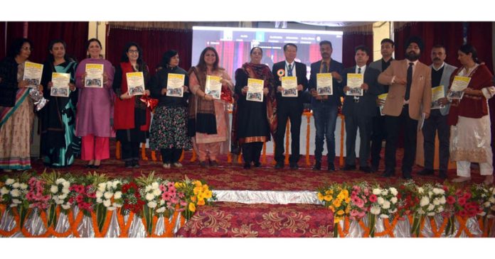 Guests releasing souvenir during inaugural International Conference at GDC Kathua on Tuesday.