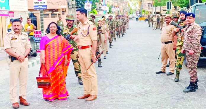 Expenditure Observer of ECI & SP South Ajay Sharma leading route march in Jammu on Wednesday. Expenditure Observer of ECI & SP South Ajay Sharma leading route march in Jammu on Wednesday.