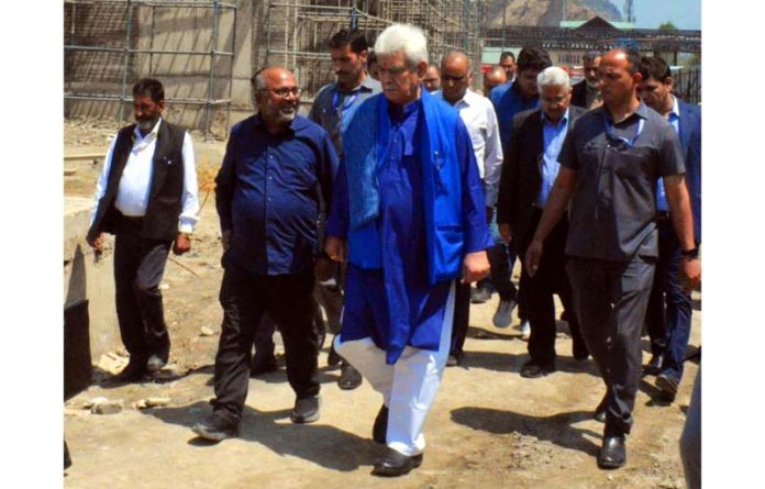 LG Manoj Sinha inspecting work on office & Yatri Niwas of SASB at Pantha Chowk, Srinagar on Monday.