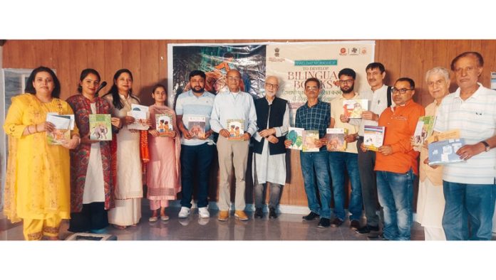 Participants and resource persons during translation work.