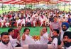 Cong candidate Raman Bhalla addressing public rally in Samba area on Monday.