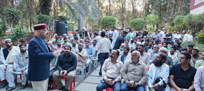 Senior BJP leader Devender Singh Rana addressing the gathering on Monday.