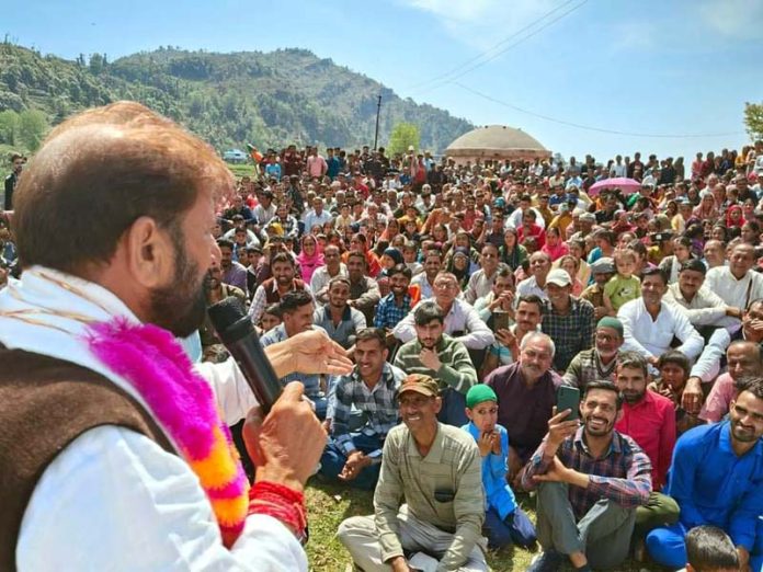 Cong candidate Ch Lal Singh addressing public rally in Lohai Malhar area of Billawar on Wednesday.