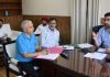 Secretary, H&ME Dr Syed Abid Rasheed Shah chairing a meeting.