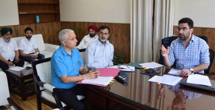 Secretary, H&ME Dr Syed Abid Rasheed Shah chairing a meeting.