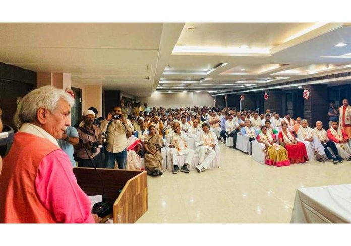 LG Manoj Sinha addressing a seminar at Varanasi on Sunday.