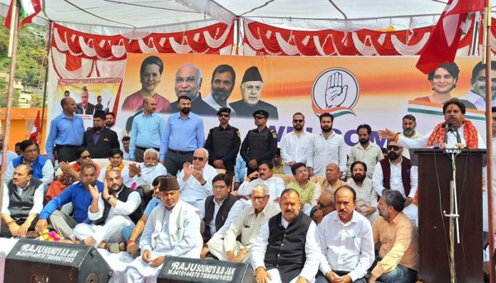 Cong candidate Raman Bhalla addressing an election rally at Katra. Former CM Dr Farooq Abdullah and senior AICC leader Bharatsinh Solanki are also seen in the picture. Cong candidate Raman Bhalla addressing an election rally at Katra. Former CM Dr Farooq Abdullah and senior AICC leader Bharatsinh Solanki are also seen in the picture.