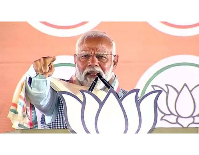 Prime Minister Narendra Modi addresses a public rally at Nawada in Bihar on Sunday.