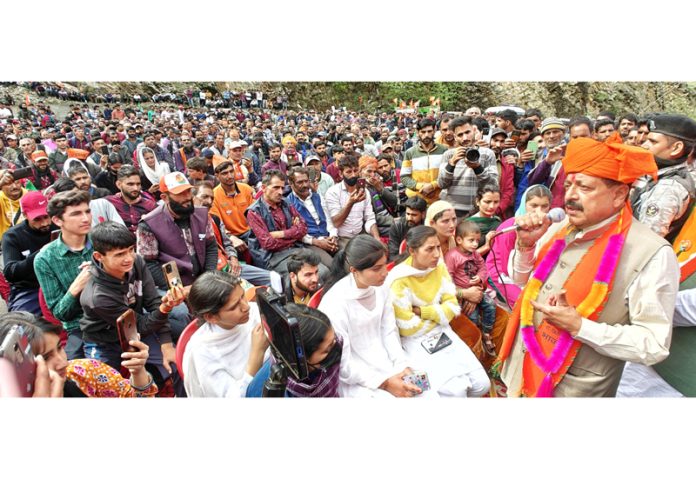 Union Minister Dr Jitendra Singh addressing a mammoth public rally at village Ukhral in Ramban.