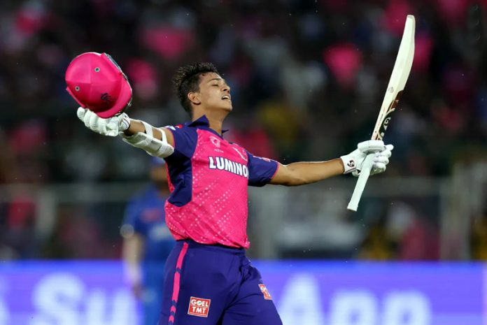Yashasvi Jaiswal raising his bat after scoring 104 of 60 balls not out against Mumbai Indians at Jaipur on Monday.