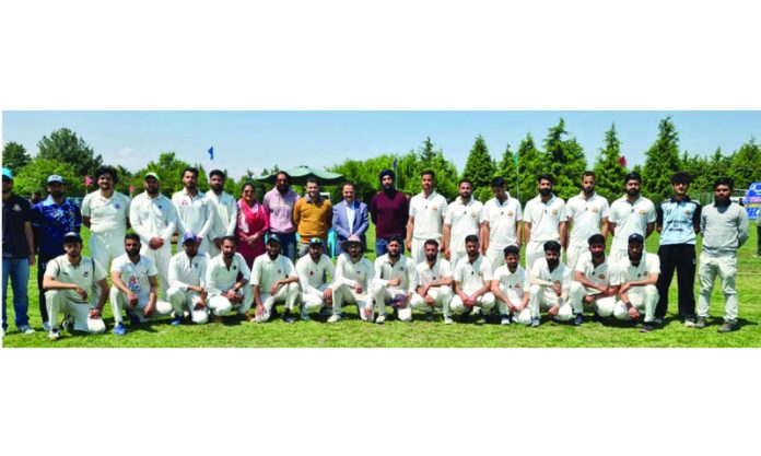 Cricket teams posing alongwith Kashmir University faculty during an inaugural cricket match in Srinagar. Cricket teams posing alongwith Kashmir University faculty during an inaugural cricket match in Srinagar.