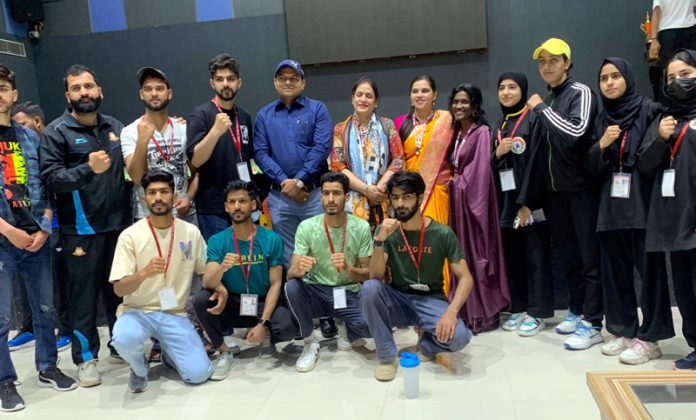 University of Kashmir players posing along with medals during All India Inter-University Qwan Ki Do tournament held in Rajasthan. University of Kashmir players posing along with medals during All India Inter-University Qwan Ki Do tournament held in Rajasthan.