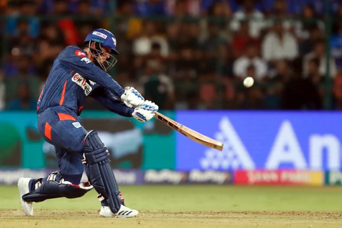 Quinton de Kock hitting a shot during his 81 runs inning against RCB.