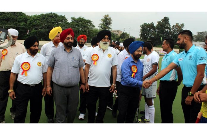 Transport Commissioner, Rajinder Singh Tara interacting with players during inaugural ceremony of hockey tournament at K K Hakku Stadium Jammu. Transport Commissioner, Rajinder Singh Tara interacting with players during inaugural ceremony of hockey tournament at K K Hakku Stadium Jammu.