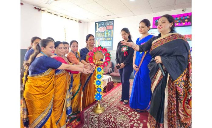 CBSE officials and teachers during a program on financial literacy at Unique International Public School, Jammu.