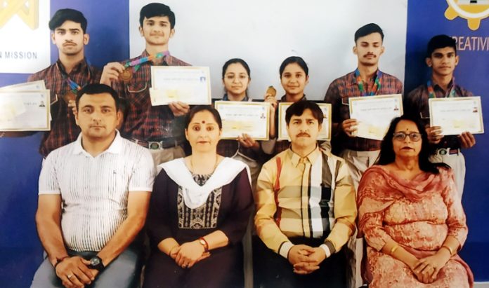 School Management of MHAC posing along with medallists. School Management of MHAC posing along with medallists.