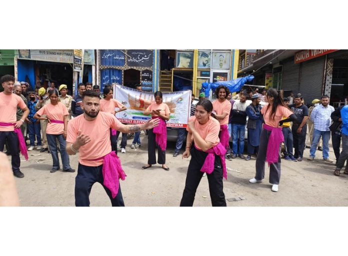 A scene from the street play 'Mera Vote, Mera Adhikar' staged at Kishtwar on Saturday.
