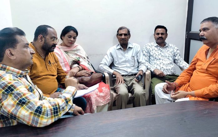 BJP Media Co-Incharge Balbir Ram Rattan in a meeting with leaders of party’s SC Morcha at Jammu on Tuesday.