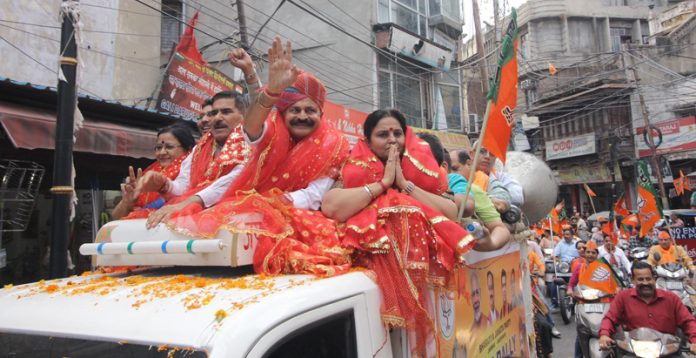 BJP leaders taking out a rally in Jammu East on Wednesday. BJP leaders taking out a rally in Jammu East on Wednesday.