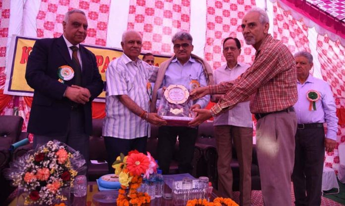 Chief Secretary, Atal Dulloo being presented a memento by KP Sabha president K K Khosa during Navreh function at Jammu on Tuesday. Chief Secretary, Atal Dulloo being presented a memento by KP Sabha president K K Khosa during Navreh function at Jammu on Tuesday.