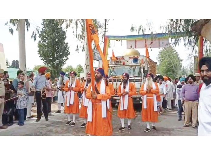 Sikh community members taking out Nagar-Kirtan at Poonch on Thursday. -Excelsior/Waseem