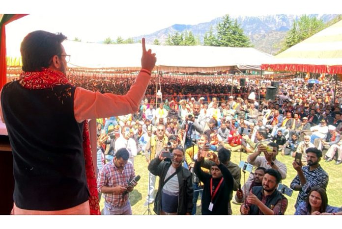Union Minister Anurag Thakur addressing a mammoth election rally at Kishtwar on Tuesday. —Excelsior/ Ajay Shan