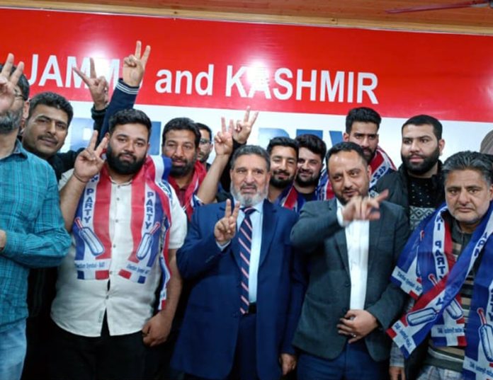 Apni Party president Altaf Bukhari welcomes new entrants into party fold in Srinagar.