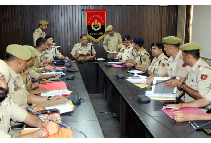 DIG JSK Range Dr Sunil Gupta chairing a meeting of officers at DPO Samba.