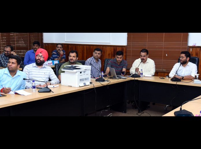 General Election Observer Rahul Ranjan Mahiwal alongwith Returning Officer Sachin Kumar Vaishya chairing a meeting.