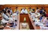 Div Com, ADGP chairing a meeting.